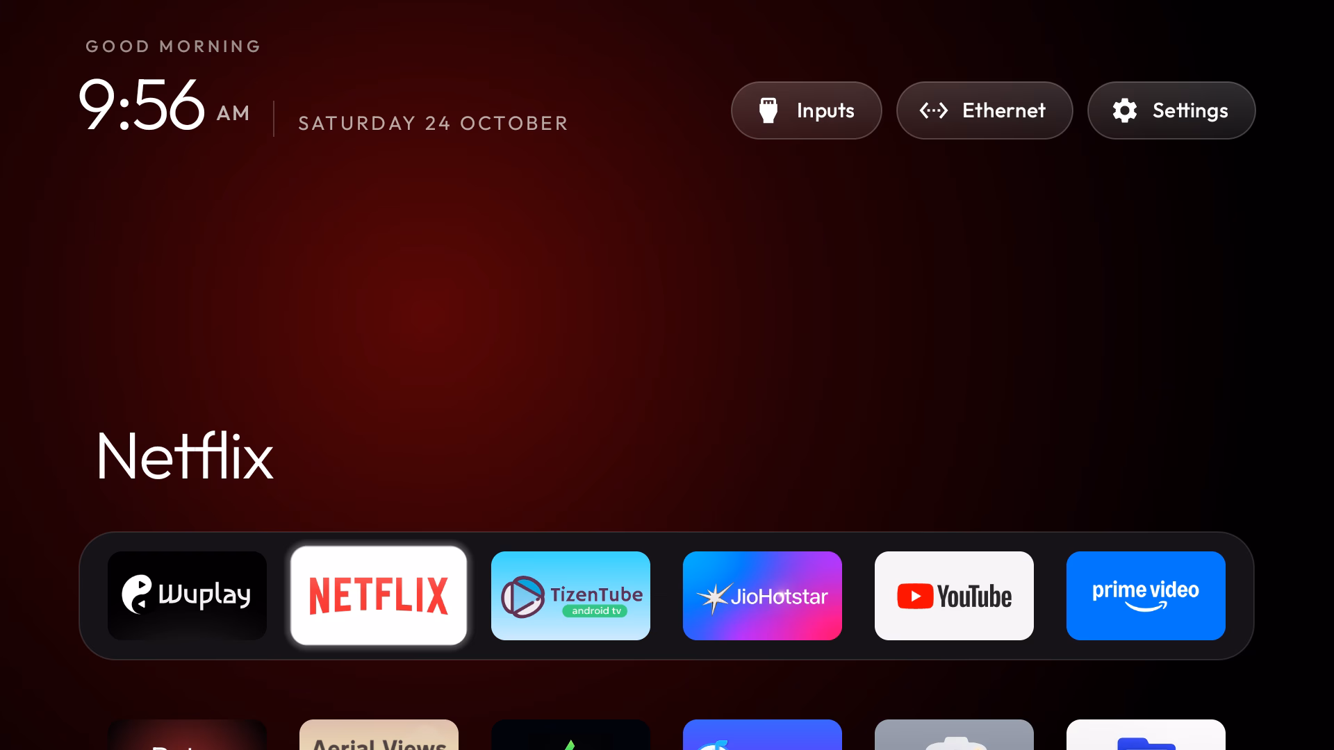 Minimalist TV launcher running on OnePlus TV with smooth dock navigation
